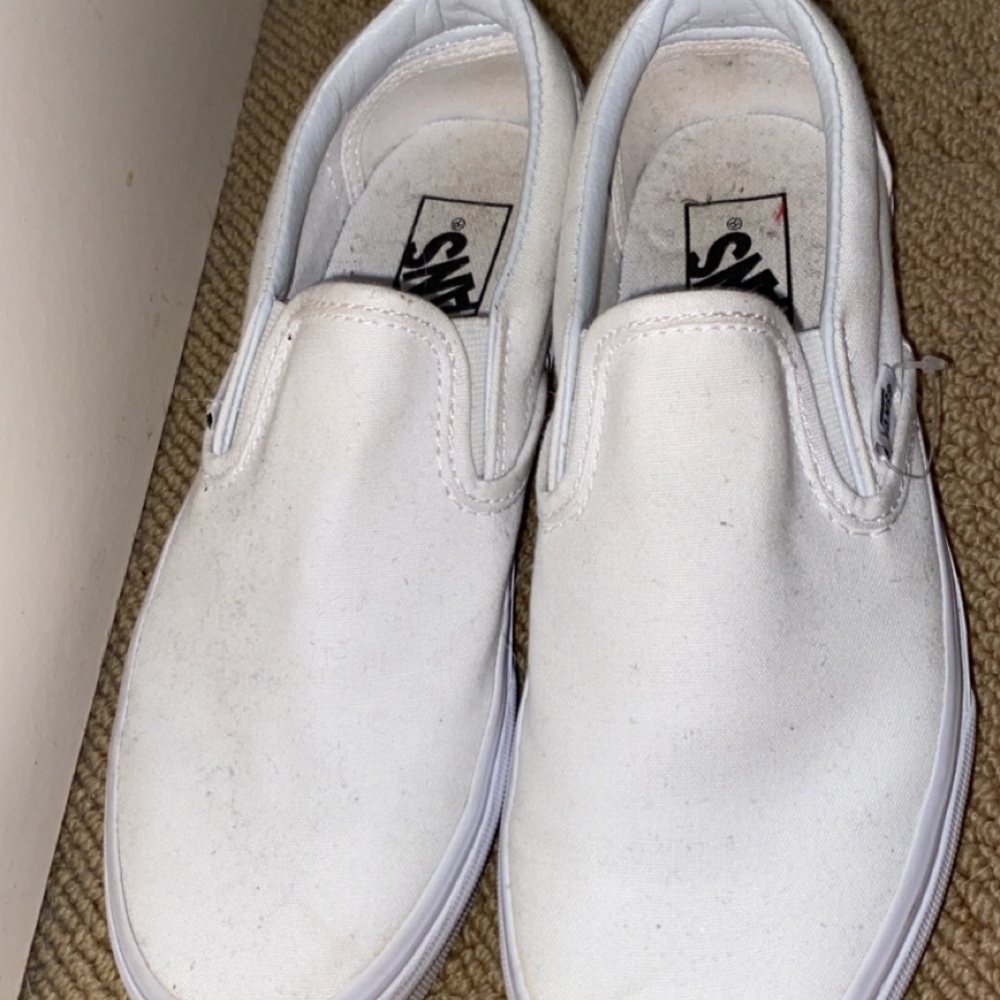 white slip on vans